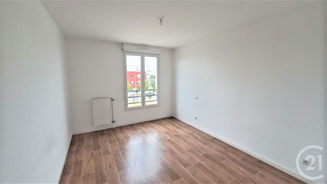 Appartement F3 à louer - 3 pièces - 62.11 m2 - BOUGUENAIS - 44 - PAYS-DE-LOIRE - Century 21 By Ouest
